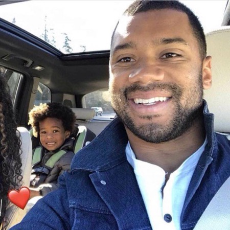 Future Zahir Wilburn with Russell Wilson in a car.